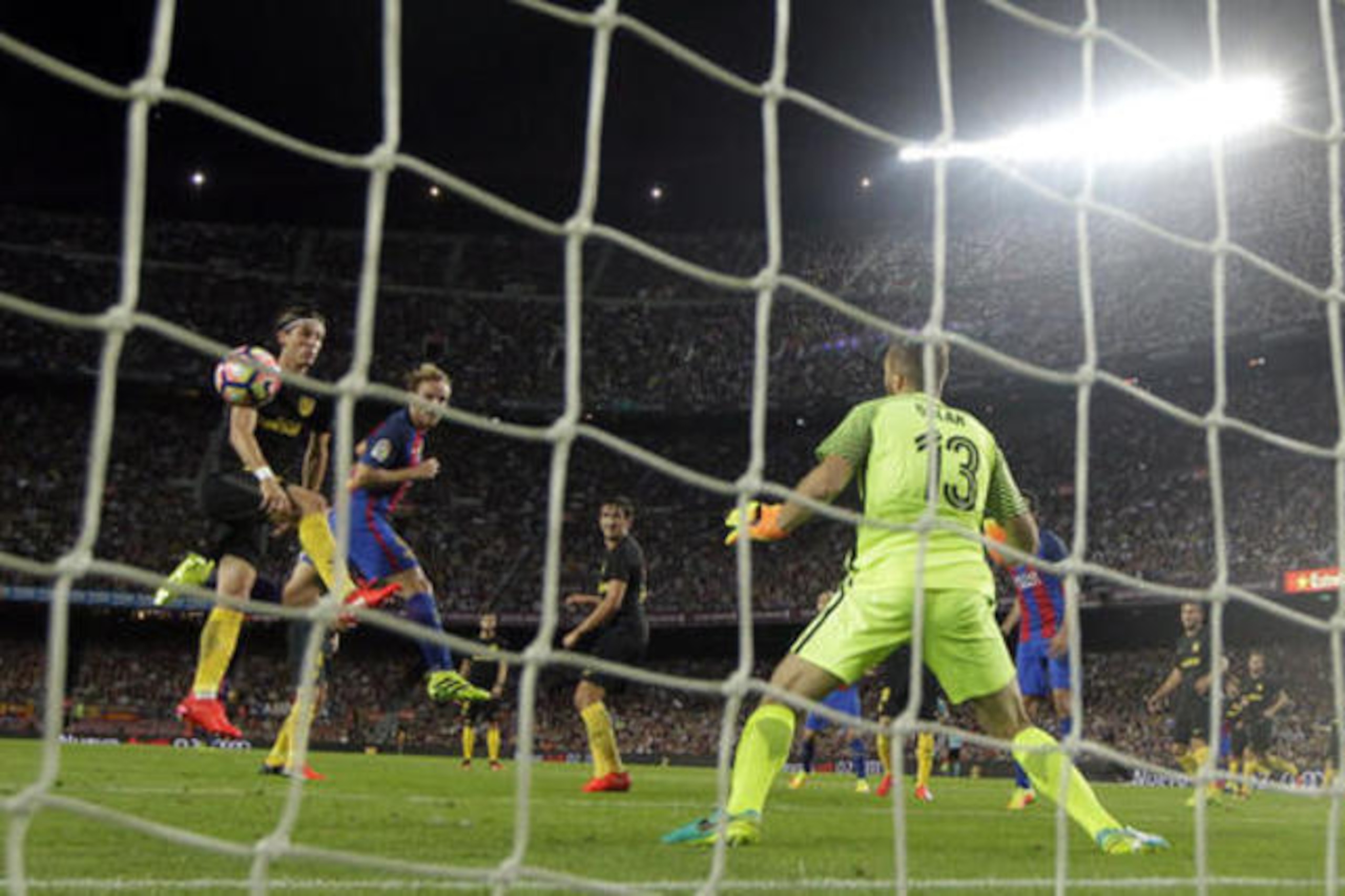 Ivan Rakitic heads home the opening goal.