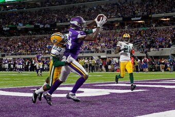Sep 18, 2016; Minneapolis, MN, USA; Minnesota Vikings wide receiver Stefon Diggs (14) catches a touchdown pass past Green Bay Packers cornerback Damarious Randall (23) in the third quarter at U.S. Bank Stadium. The Vikings win 17-14. Mandatory Credit: Bru