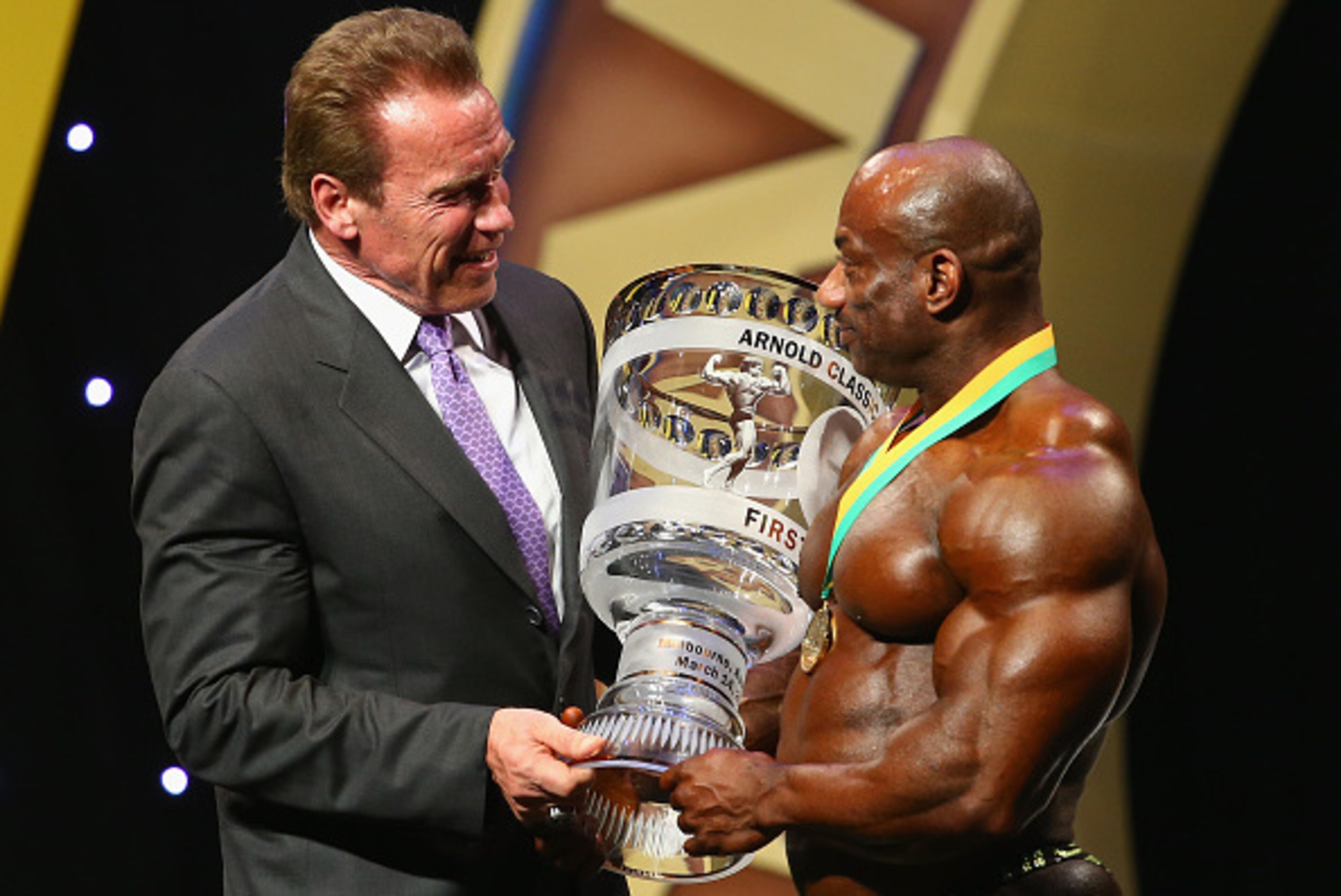 MELBOURNE, AUSTRALIA - MARCH 14:  Arnold Schwarzenegger poses with winner Dexter Jackson of the USA after winning the Arnold Classic Australia at The Melbourne Convention and Exhibition Centre on March 14, 2015 in Melbourne, Australia.  (Photo by Robert C