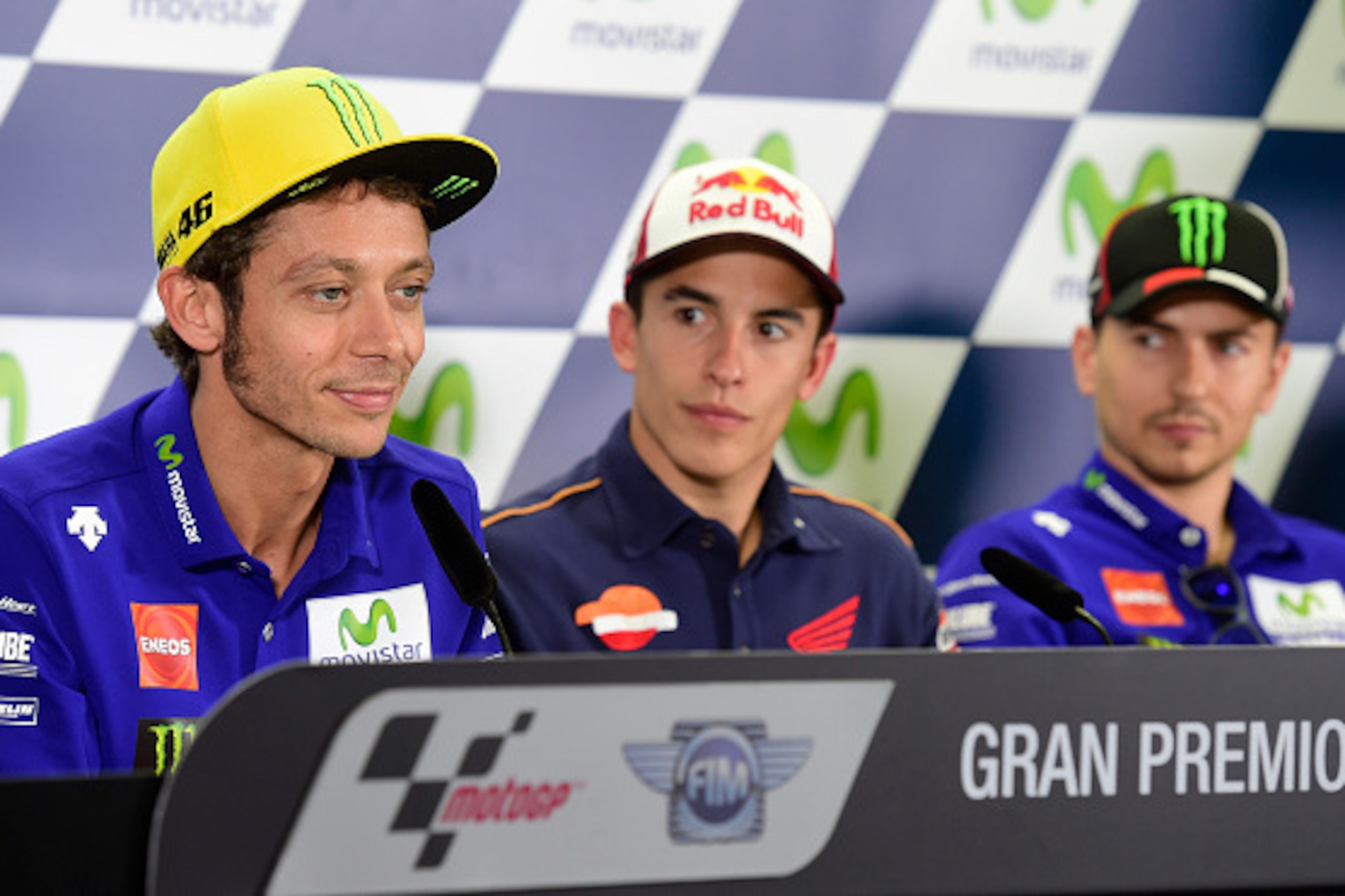 Yamaha Team's Italian rider Valentino Rossi (L), Repsol Honda's Spanish rider Marc Marquez (C) and Yamaha Team's Spanish rider Jorge Lorenzo attend a press conference during the Aragon Grand Prix at Motorland racetrack in Alcaniz, on September 22, 2016. /