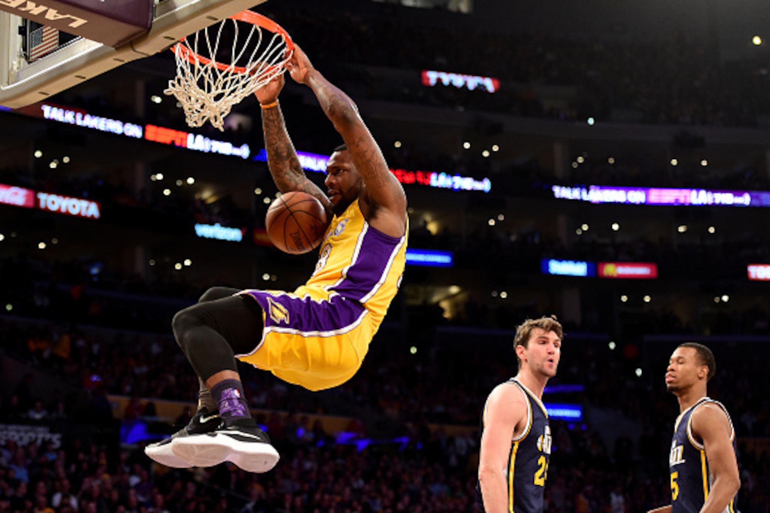 LOS ANGELES, CA - APRIL 13:  Tarik Black #28 of the Los Angeles Lakers dunks the ball in the second half against the Utah Jazz at Staples Center on April 13, 2016 in Los Angeles, California. NOTE TO USER: User expressly acknowledges and agrees that, by do