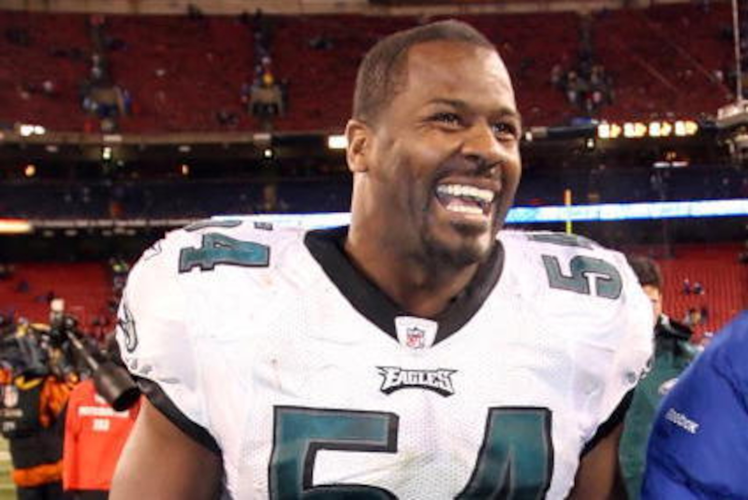 EAST RUTHERFORD, NJ - DECEMBER 13: Linebacker Jeremiah Trotter #54 of the Philadelphia Eagles walks off the field after a game against the New York Giants on December 13, 2009 at Giants Stadium in East Rutherford, New Jersey. The Eagles won 45-38. (Photo 