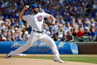 CHICAGO, IL - SEPTEMBER 17:  Jake Arrieta #49 of the Chicago Cubs pitches against the Milwaukee Brewers during the first inning at Wrigley Field on September 17, 2016 in Chicago, Illinois.  (Photo by Jon Durr/Getty Images)