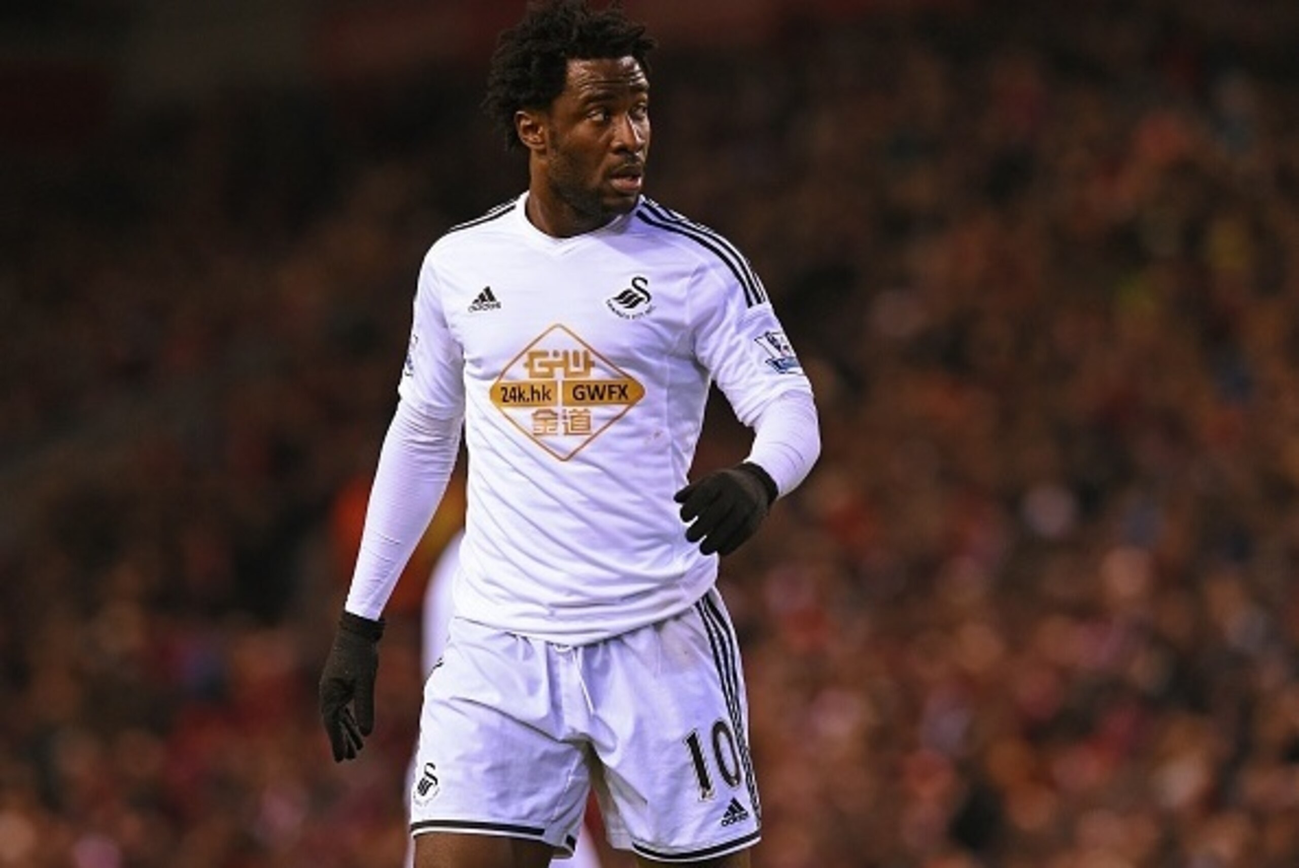 Swansea City's Ivorian striker Wilfried Bony looks on during the English Premier League football match between Liverpool and Swansea City at Anfield in Liverpool, north west England, on December 29, 2014. Liverpool won the game 4-1. AFP PHOTO / PAUL ELLIS
