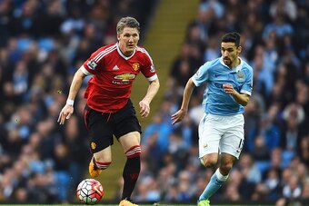 MANCHESTER, ENGLAND - MARCH 20:  Bastian Schweinsteiger of Manchester United is chased by Jesus Navas of Manchester City during the Barclays Premier League match between Manchester City and Manchester United at Etihad Stadium on March 20, 2016 in Manchest