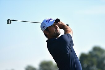 PASSAU, GERMANY - SEPTEMBER 23: Alexander Levy of France looks on after playing an iron shot during the continuation of the weather delayed first round of the Porsche European Open at Golf Resort Bad Griesbach on September 23, 2016 in Passau, Germany.  (P