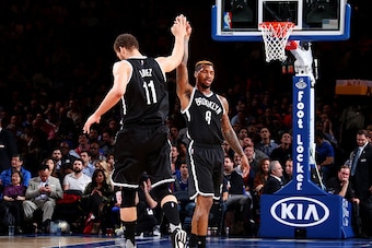 NEW YORK, NY - APRIL 1: Brook Lopez #11 of the Brooklyn Nets high fives his teammate Sean Kilpatrick #6 of the Brooklyn Nets during the game against the New York Knicks on April 1, 2016 at Madison Square Garden in New York City, New York.  NOTE TO USER: U