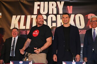 MANCHESTER, ENGLAND - APRIL 27:  Tyson Fury dances next to Wladimir Klitschko as they go head to head during a press conference at the Manchester Arena on April 27, 2016 in Manchester, England.  (Photo by Alex Livesey/Getty Images)
