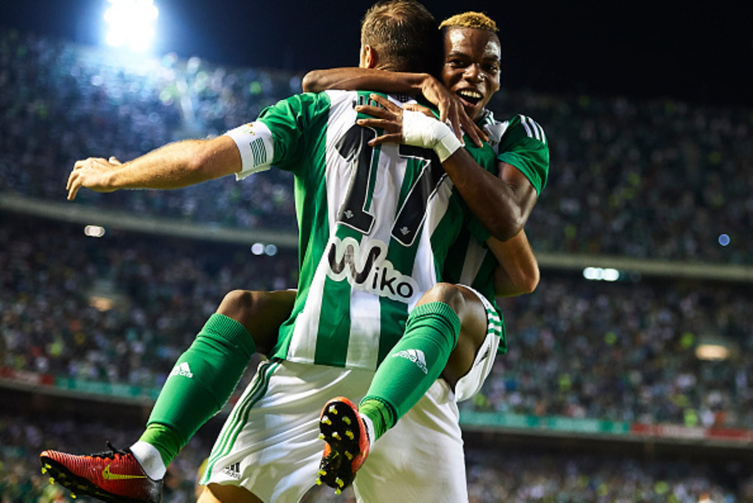 SEVILLE, SPAIN - SEPTEMBER 23:  b17 Joaquin Sanchez of Real Betis Balompie celebrates after scoring with Charly Musonda of Real Betis Balompie during the match between Real Betis Balompie vs Malaga CF as part of La Liga at Benito Villamarin stadium on Sep