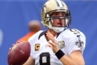 Sep 18, 2016; East Rutherford, NJ, USA;  New Orleans Saints quarterback Drew Brees (9) looks to pass the ball during the first half of their game against the New York Giants at MetLife Stadium. Mandatory Credit: Ed Mulholland-USA TODAY Sports