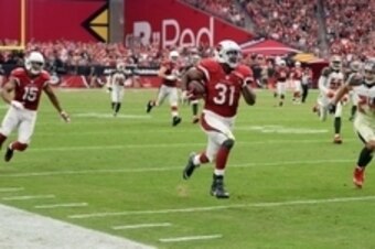 Sep 18, 2016; Glendale, AZ, USA; Arizona Cardinals running back David Johnson (31) runs with the ball against the Tampa Bay Buccaneers during the second half at University of Phoenix Stadium. The Cardinals won 40-7. Mandatory Credit: Joe Camporeale-USA TO