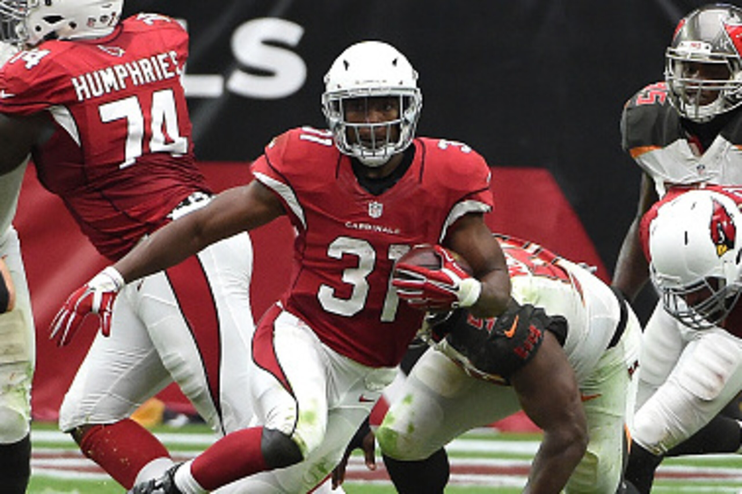 GLENDALE, AZ - SEPTEMBER 18: Running back David Johnson #31 of the Arizona Cardinals runs up field during the second quarter of the NFL game against the Tampa Bay Buccaneers at University of Phoenix Stadium on September 18, 2016 in Glendale, Arizona. (Ph GLENDALE, AZ - SEPTEMBER 18: Running back David Johnson #31 of the Arizona Cardinals runs up field during the second quarter of the NFL game against the Tampa Bay Buccaneers at University of Phoenix Stadium on September 18, 2016 in Glendale, Arizona. (Ph
