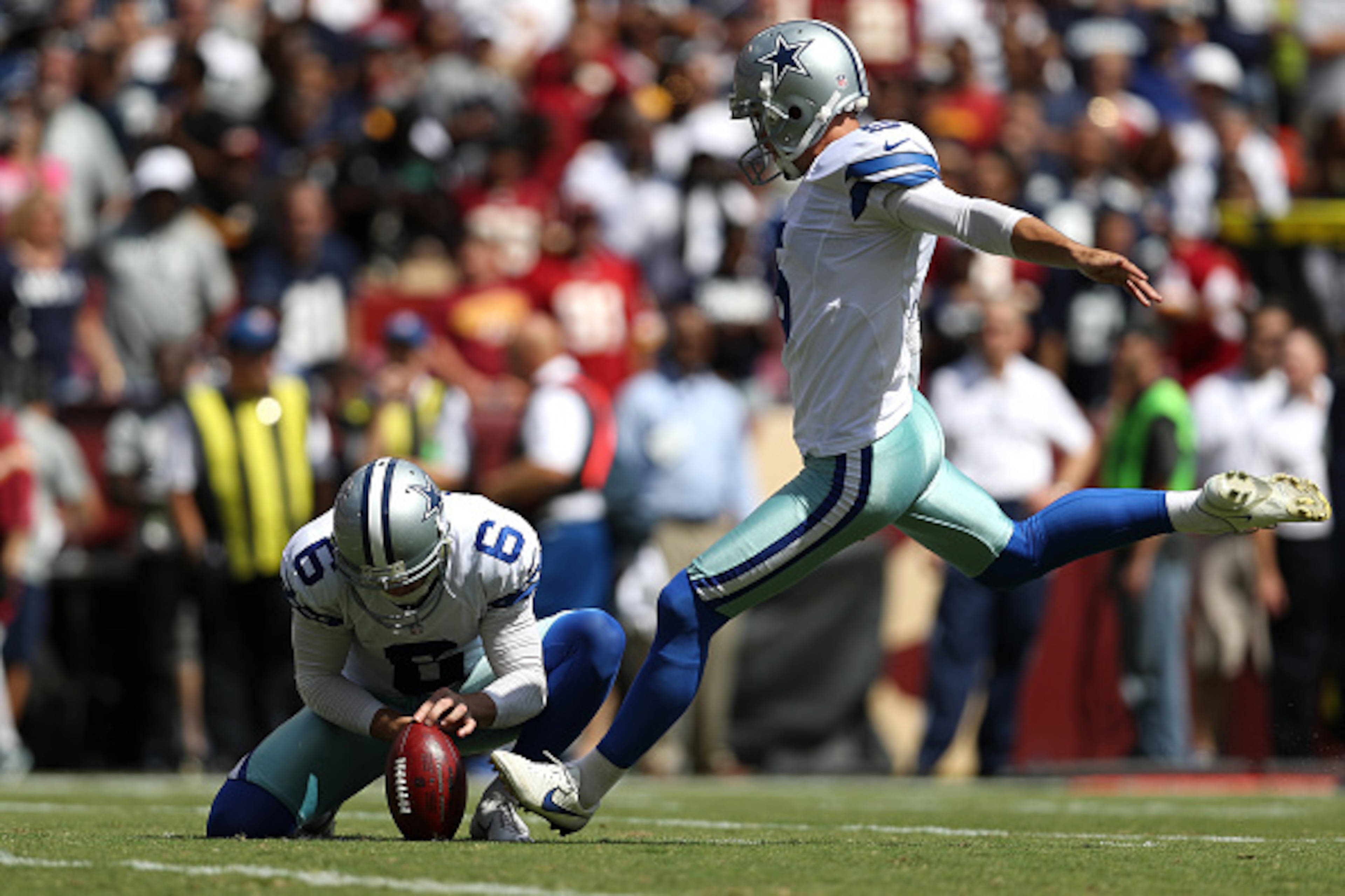 LANDOVER, MD - SEPTEMBER 18: Kicker Dan Bailey #5 of the Dallas Cowboys kicks a first quarter field goal against the Washington Redskins at FedExField on September 18, 2016 in Landover, Maryland. (Photo by Patrick Smith/Getty Images)