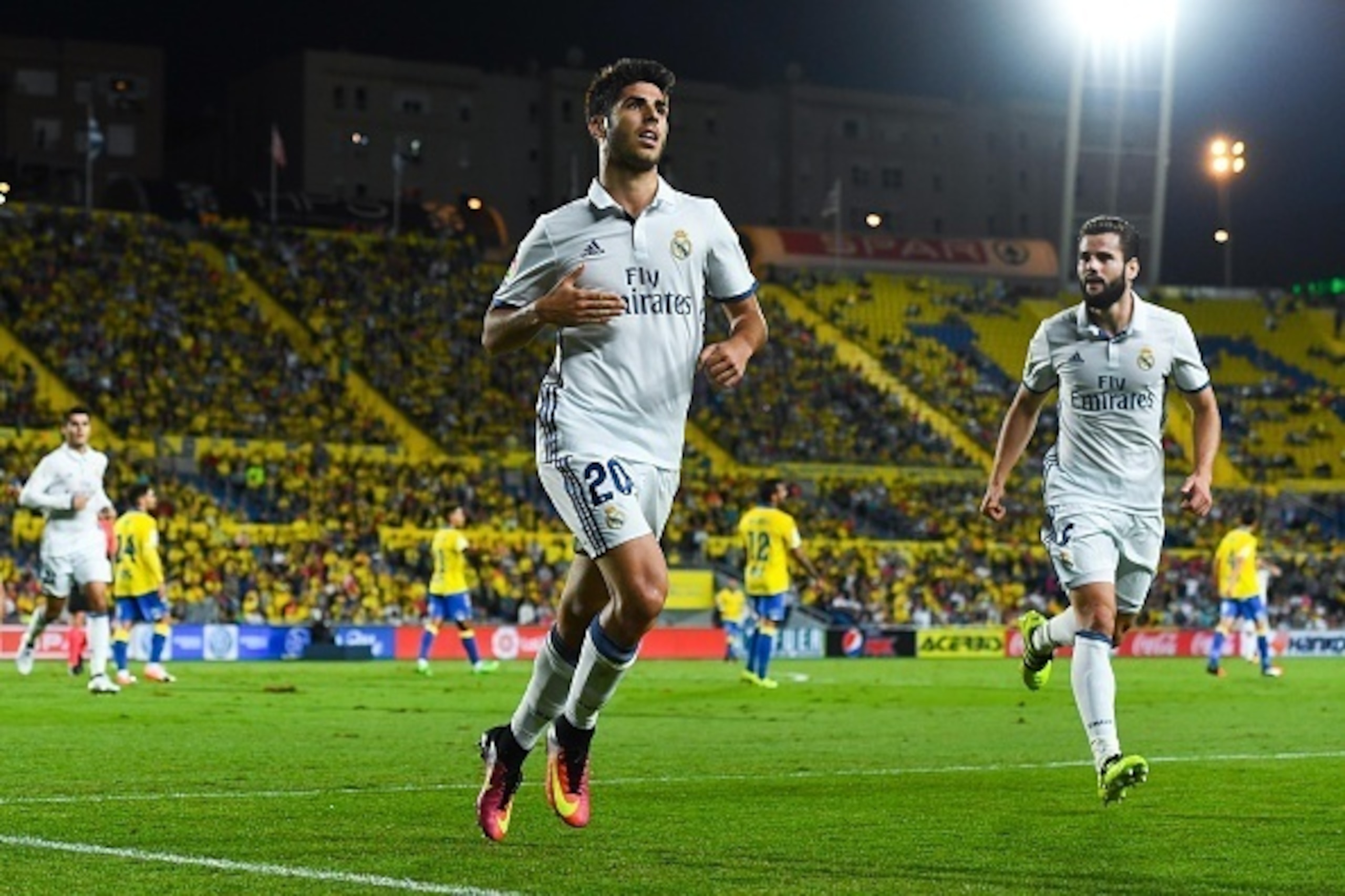 LAS PALMAS, SPAIN - SEPTEMBER 24:  Marco Asensio of Real Madrid CF celebrates after scoring his team's first goal during the La Liga match between UD Las Palmas and Real Madrid CF on September 24, 2016 in Las Palmas, Spain.  (Photo by David Ramos/Getty Im