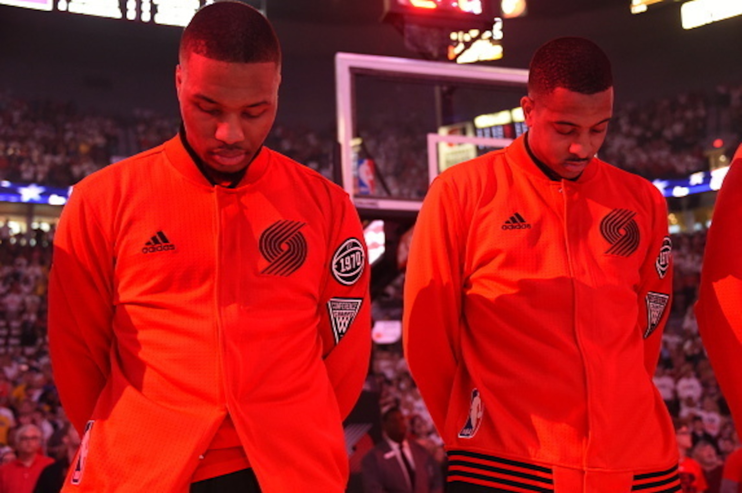 PORTLAND, OR - MAY 7:  Damian Lillard #0 of the Portland Trail Blazers and C.J. McCollum #3 of the Portland Trail Blazers stand for the national anthem before the game against the Golden State Warriors in Game Three of the Western Conference Semifinals du