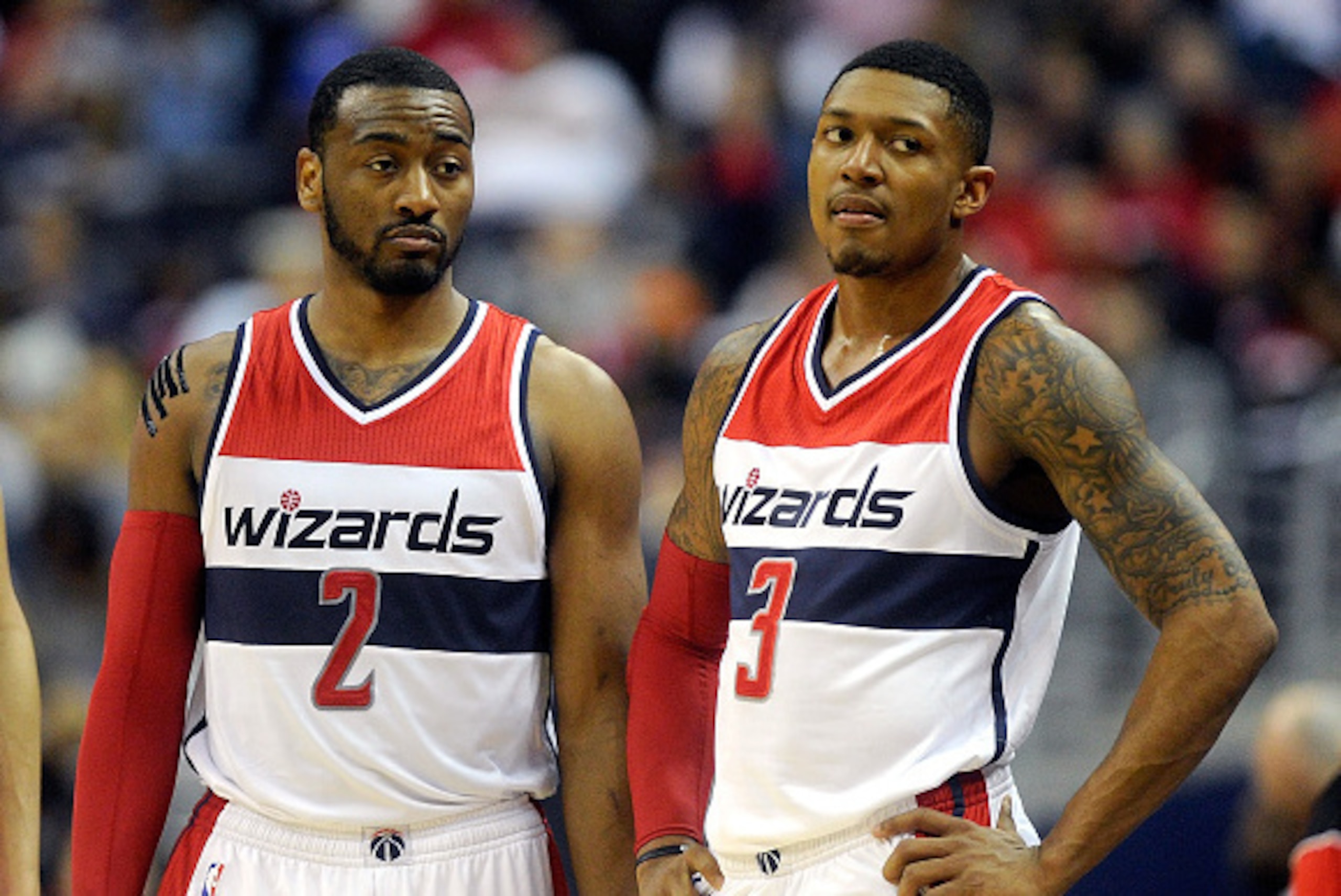 WASHINGTON, DC - APRIL 26:  John Wall #2 and Bradley Beal #3 of the Washington Wizards talk during the game against the Toronto Raptors during Game Four of the Eastern Conference Quarterfinals of the NBA playoffs at Verizon Center on April 26, 2015 in Was