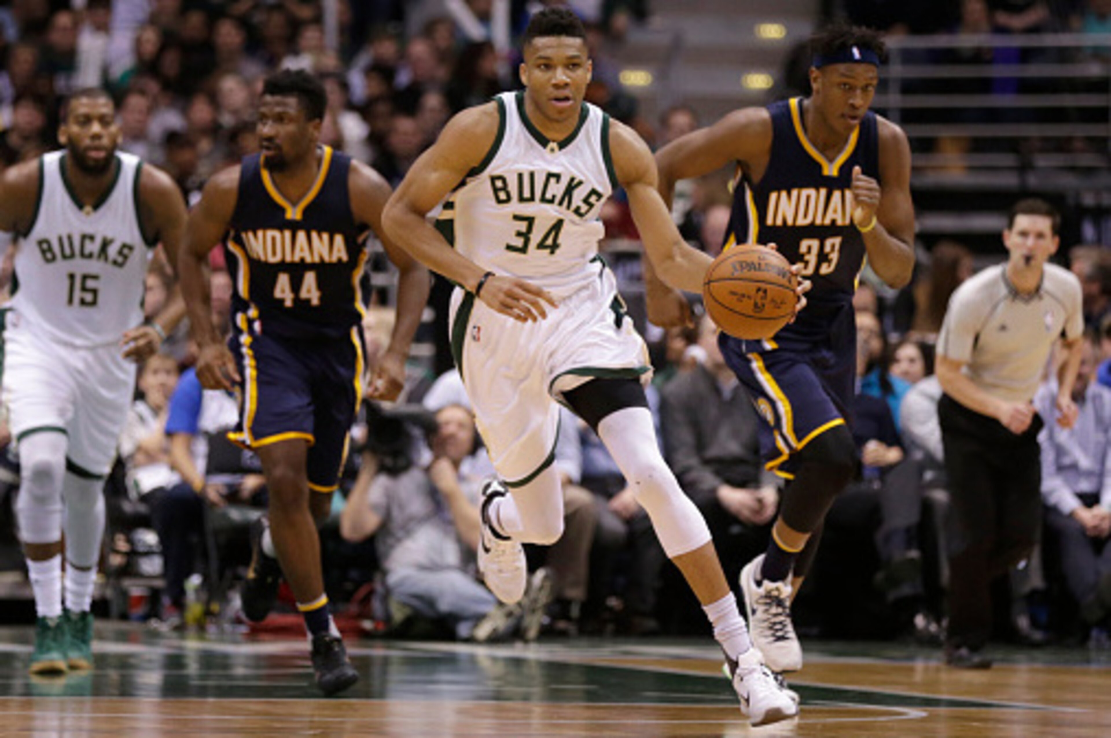 MILWAUKEE, WI - APRIL 13: Giannis Antetokounmpo #34 of the Milwaukee Bucks dribbles the basketball up the court on a fast break during the second quarter against the Indiana Pacers at BMO Harris Bradley Center on April 13, 2016 in Milwaukee, Wisconsin. NO