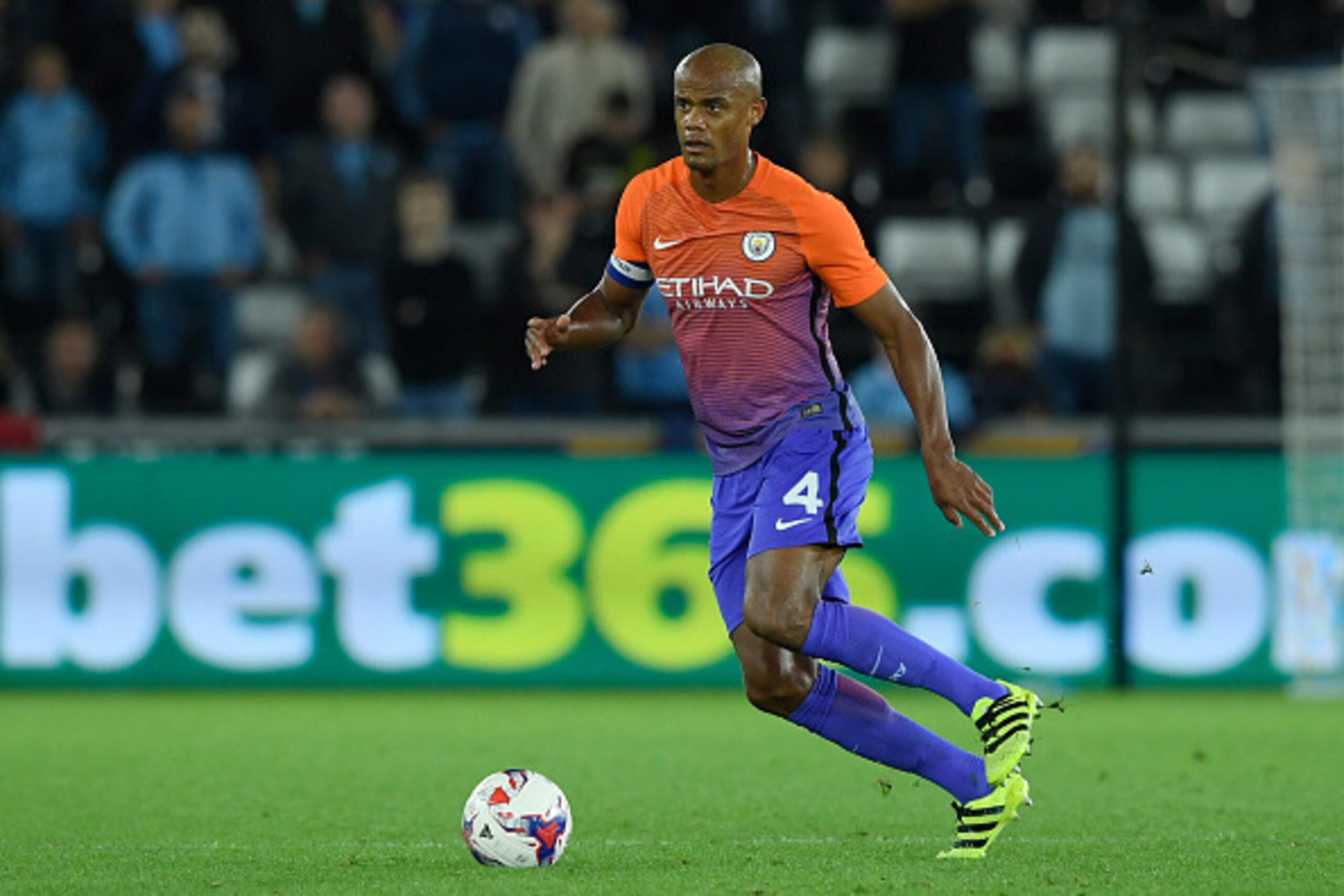 SWANSEA, WALES - SEPTEMBER 21:  Vincent Kompany of Manchester City in action during the  EFL Cup Third Round match between Swansea City and Manchester City at the Liberty Stadium on September 21, 2016 in Swansea, Wales.  (Photo by Stu Forster/Getty Images