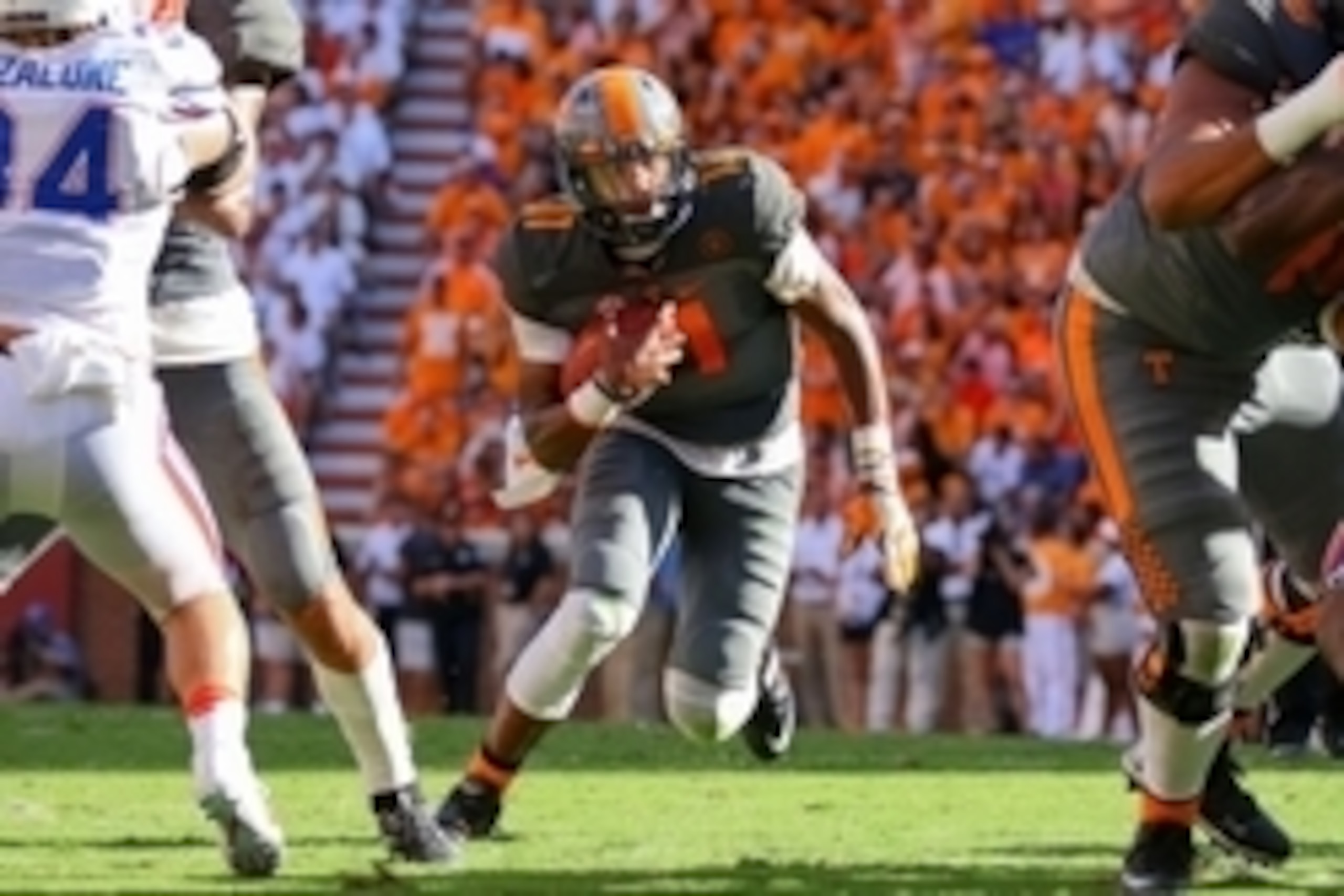 Sep 24, 2016; Knoxville, TN, USA; Tennessee Volunteers quarterback Joshua Dobbs (11) runs the ball against the Florida Gators during the second quarter at Neyland Stadium. Mandatory Credit: Randy Sartin-USA TODAY Sports Sep 24, 2016; Knoxville, TN, USA; Tennessee Volunteers quarterback Joshua Dobbs (11) runs the ball against the Florida Gators during the second quarter at Neyland Stadium. Mandatory Credit: Randy Sartin-USA TODAY Sports