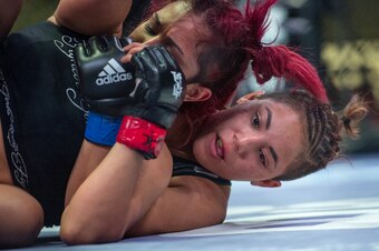 Batara, right, in her fight with Nicdali Rivera-Calanoc