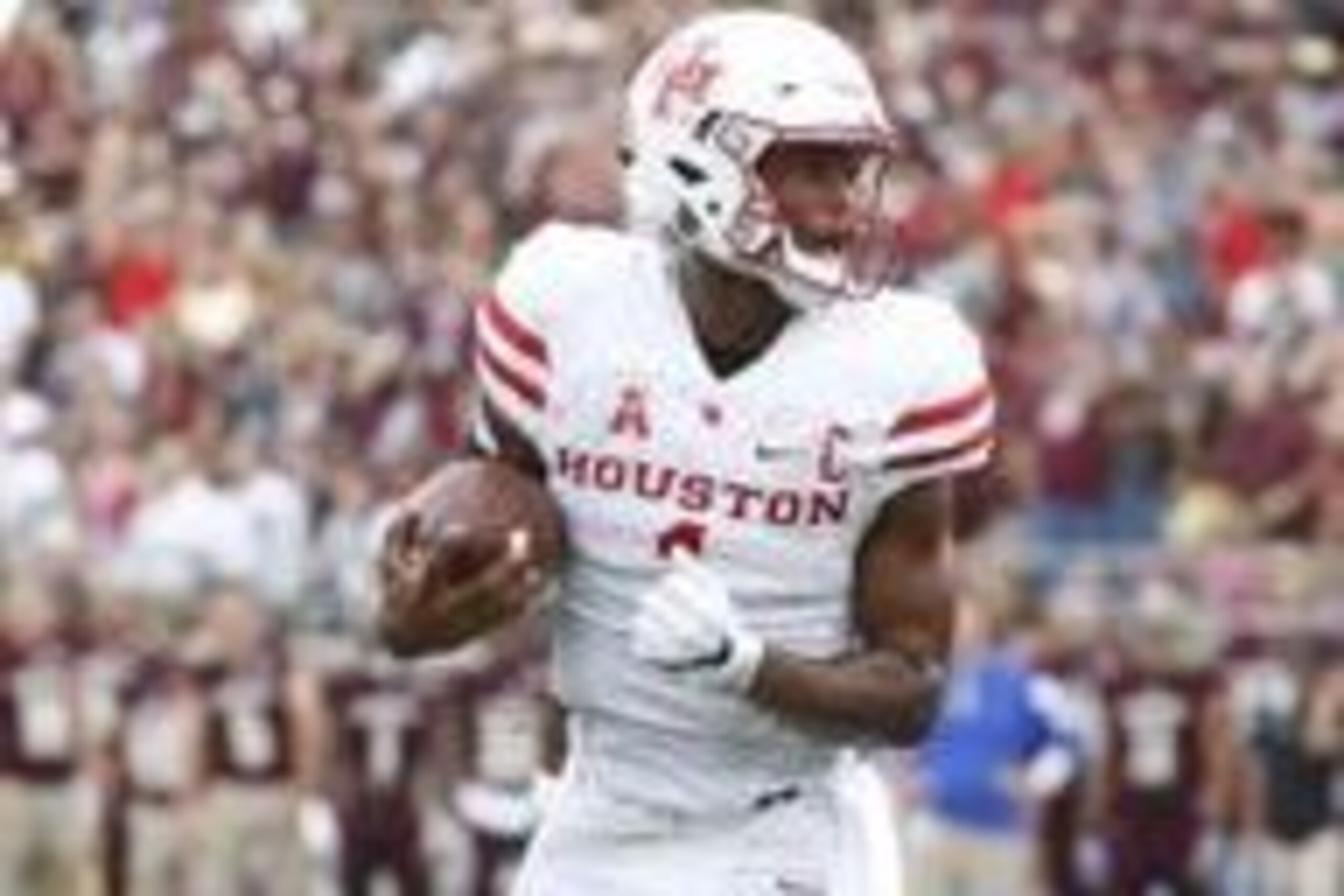Sep 24, 2016; San Marcos, TX, USA; Houston Cougars quarterback Greg Ward Jr. (1) runs the ball for a touchdown against the Texas State Bobcats at Bobcat Stadium. Mandatory Credit: Soobum Im-USA TODAY Sports