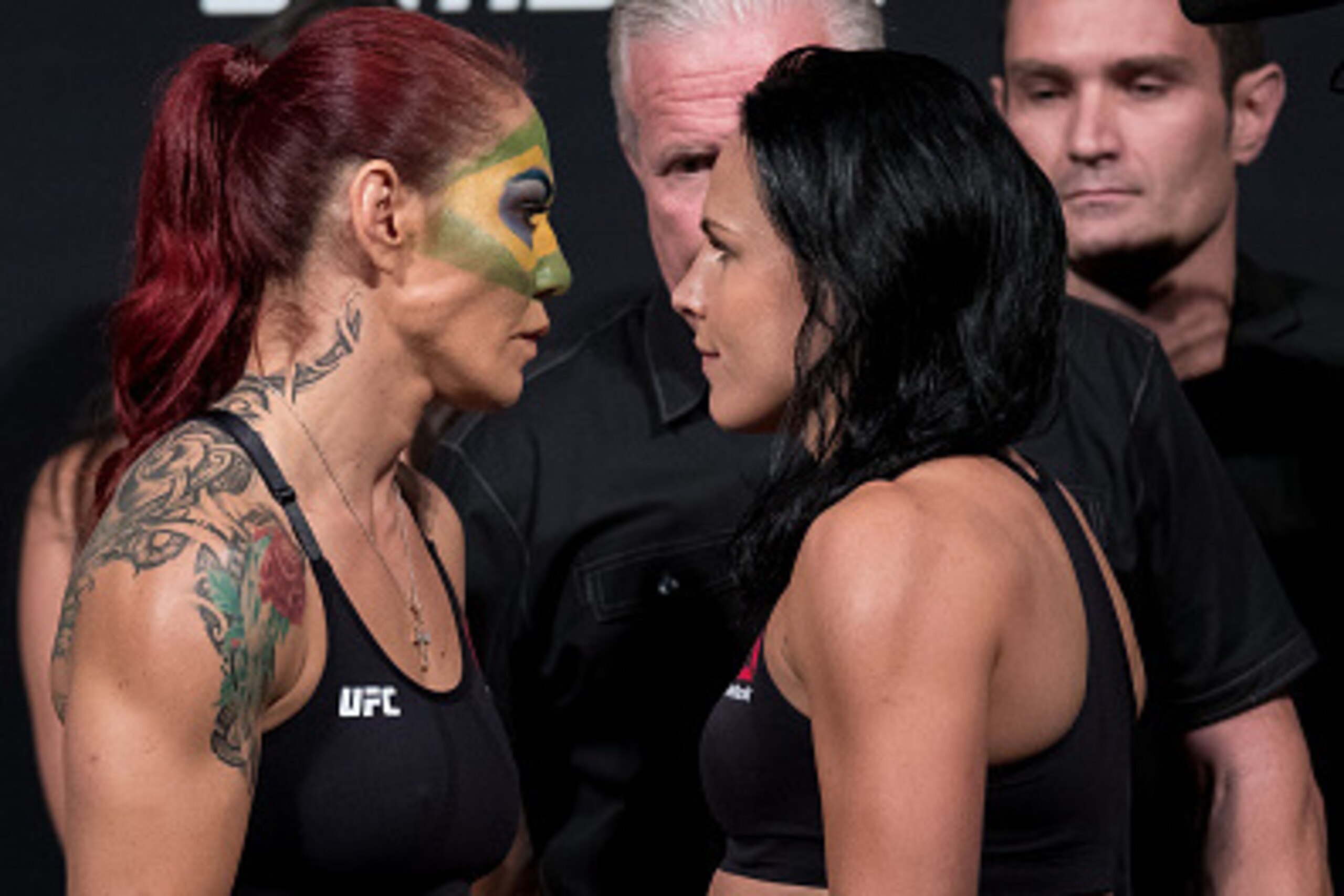 BRASILIA, BRAZIL - SEPTEMBER 23: Opponents Cris Cyborg (L) of Brazil and Lina Lansberg of Sweden face off during the UFC Fight Night weigh-in at Nilson Nelson gymnasium on September 23, 2016 in Brasilia, Brazil. (Photo by Buda Mendes/Zuffa LLC/Zuffa LLC v