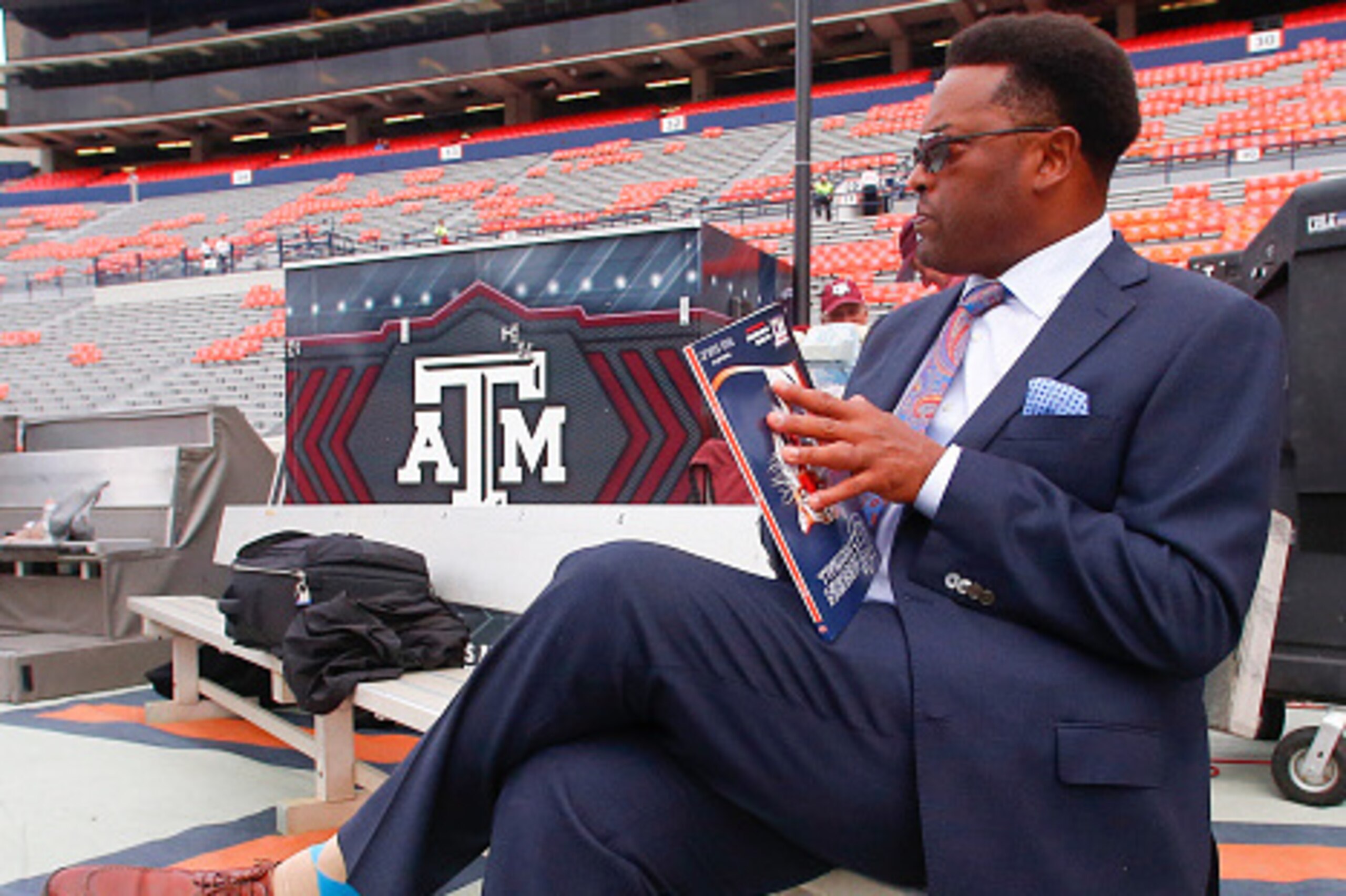 AUBURN, AL - SEPTEMBER 17:  Texas A&M Aggies head coach Kevin Sumlin sits on a bench looking at the game program before an NCAA college football game the Auburn Tigers on September 17, 2016 in Auburn, Alabama. (Photo by Butch Dill/Getty Images)