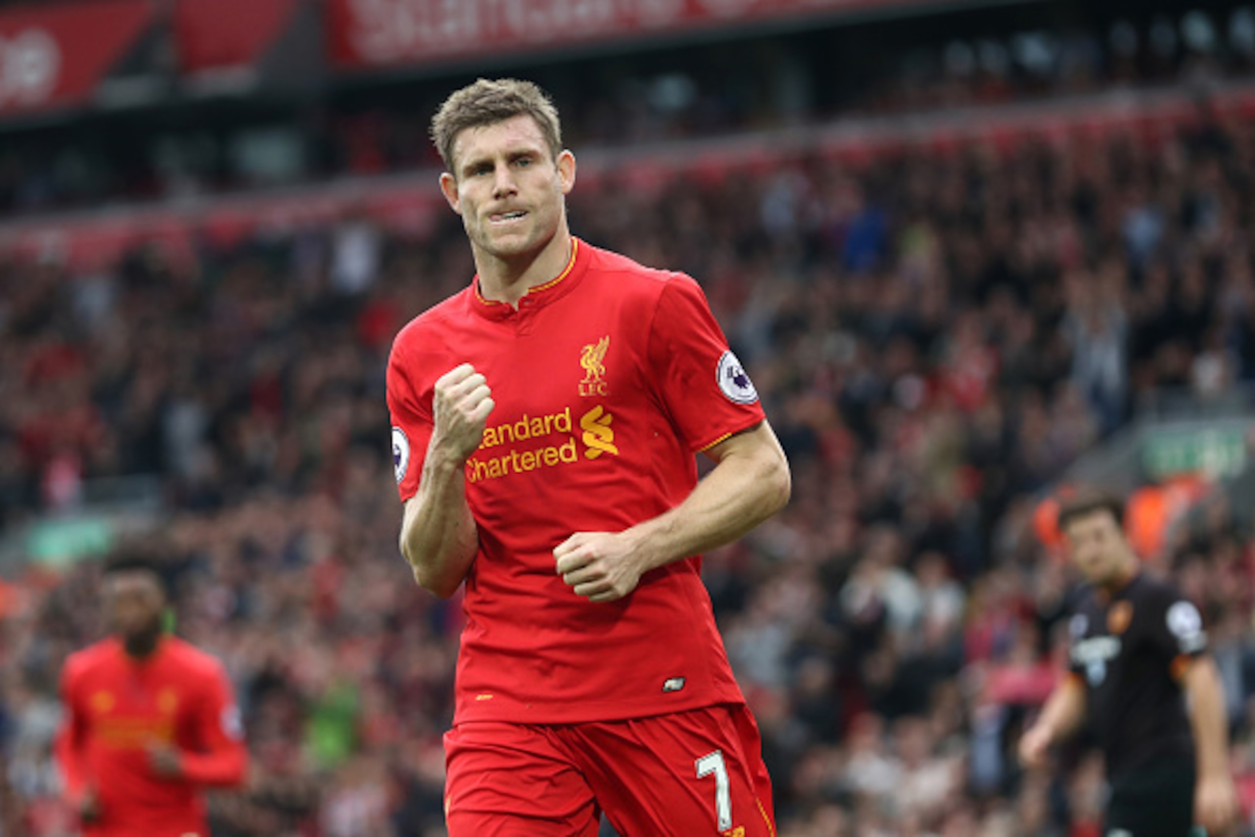 LIVERPOOL, ENGLAND - SEPTEMBER 24:  James Milner of Liverpool celebrates as he scores his sides fifth goal during the Premier League match between Liverpool and Hull City at Anfield on September 24, 2016 in Liverpool, England.  (Photo by Julian Finney/Get