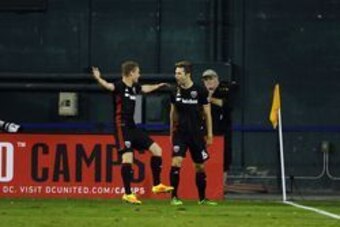 Sep 24, 2016; Washington, DC, USA; D.C. United forward Patrick Mullins (16) is congratulated by D.C. United defender Taylor Kemp (2) after scoring a gaol against the Orlando City FC during the first half at Robert F. Kennedy Memorial. Mandatory Credit: Br