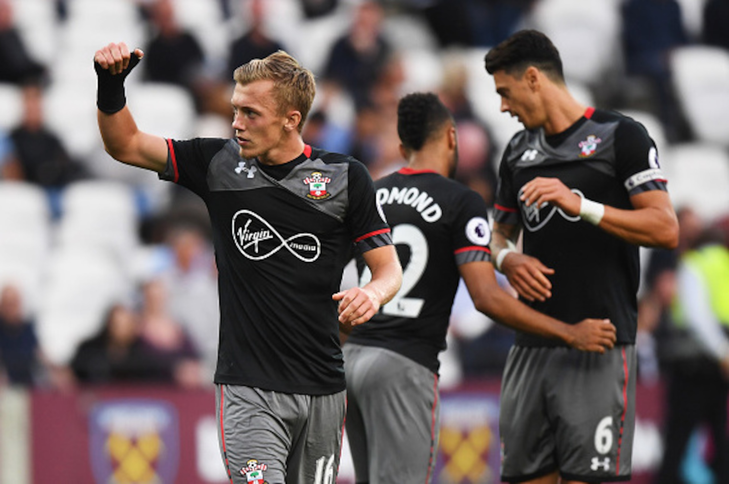 LONDON, ENGLAND - SEPTEMBER 25:  James Ward-Prowse of Southampton (16) celebrates with team mates as he scores their third goal during the Premier League match between West Ham United and Southampton at London Stadium on September 25, 2016 in London, Engl