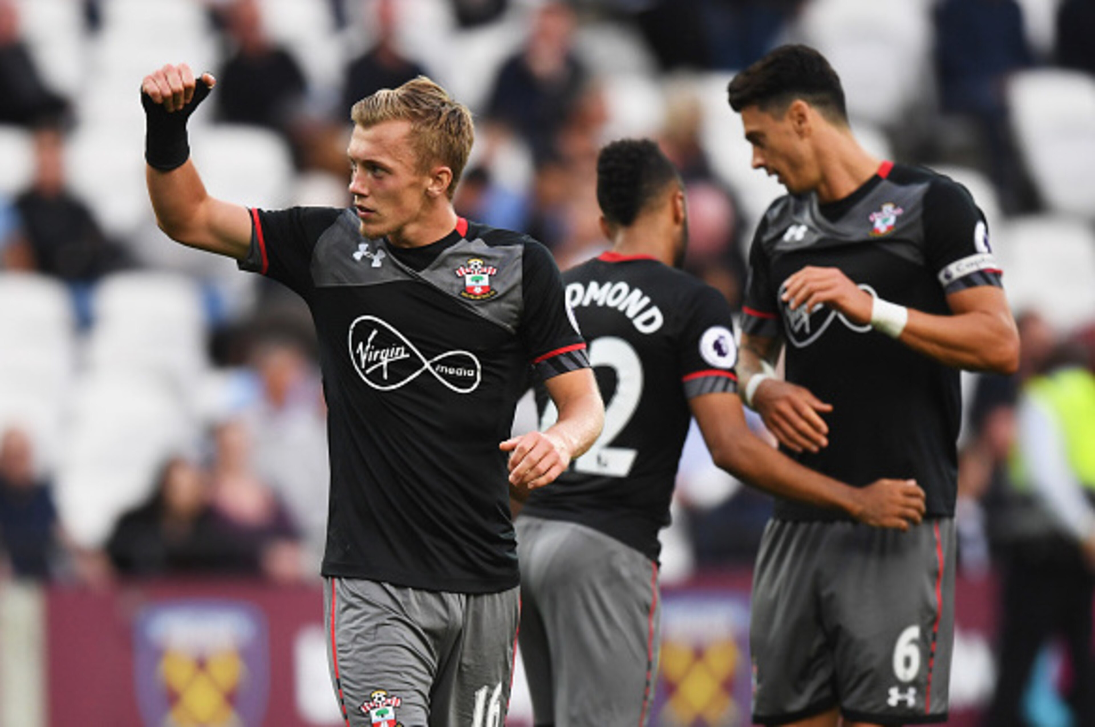 LONDON, ENGLAND - SEPTEMBER 25:  James Ward-Prowse of Southampton (16) celebrates with team mates as he scores their third goal during the Premier League match between West Ham United and Southampton at London Stadium on September 25, 2016 in London, Engl