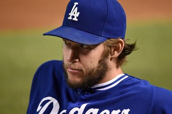 PHOENIX, AZ - JUNE 13:  Clayton Kershaw #22 of the Los Angeles Dodgers stretches prior to a game against the Arizona Diamondbacks at Chase Field on June 13, 2016 in Phoenix, Arizona.  (Photo by Norm Hall/Getty Images)