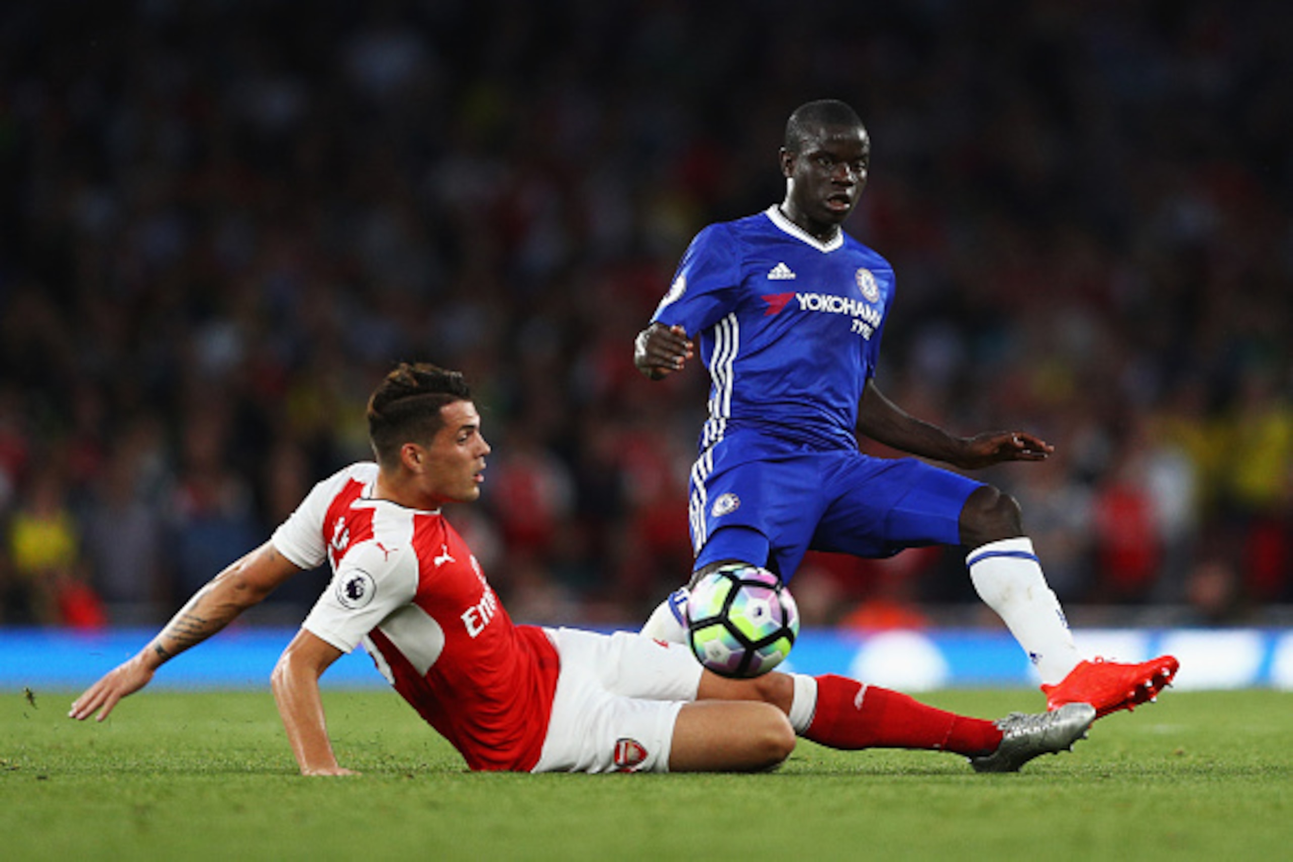 LONDON, ENGLAND - SEPTEMBER 24: N'Golo Kante of Chelsea is tackled by Granit Xhaka of Arsenal during the Premier League match between Arsenal and Chelsea at the Emirates Stadium on September 24, 2016 in London, England. (Photo by Paul Gilham/Getty Imag LONDON, ENGLAND - SEPTEMBER 24: N'Golo Kante of Chelsea is tackled by Granit Xhaka of Arsenal during the Premier League match between Arsenal and Chelsea at the Emirates Stadium on September 24, 2016 in London, England. (Photo by Paul Gilham/Getty Imag