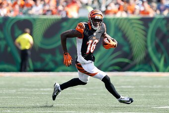 CINCINNATI, OH - SEPTEMBER 25:  A.J. Green #18 of the Cincinnati Bengals carries the ball during the fourth quarter of the game against the Denver Broncos at Paul Brown Stadium on September 25, 2016 in Cincinnati, Ohio. (Photo by Joe Robbins/Getty Images)