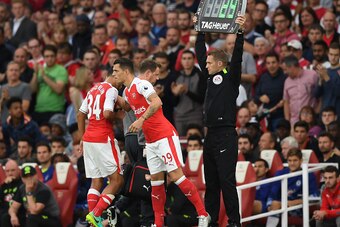 LONDON, ENGLAND - SEPTEMBER 24: Francis Coquelin of Arsneal (L) is replaced by Granit Xhaka of Arsenal (R)  during the Premier League match between Arsenal and Chelsea at the Emirates Stadium on September 24, 2016 in London, England.  (Photo by Shaun Bott