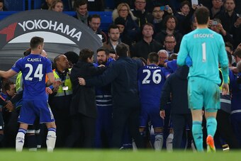 LONDON, ENGLAND - MAY 02 :  Mauricio Pochettino manager of Tottenham Hotspur is held back as a melee breaks out after the Barclays Premier League match between Chelsea and Tottenham Hotspur at Stamford Bridge on May 2, 2016 in London, England.  (Photo by 