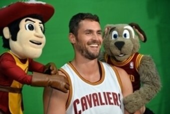 Sep 26, 2016; Cleveland, OH, USA; Cleveland Cavaliers forward Kevin Love (0) films a scoreboard segment with Sir CC and Moondog during media day at Cleveland Clinic Courts. Mandatory Credit: Ken Blaze-USA TODAY Sports