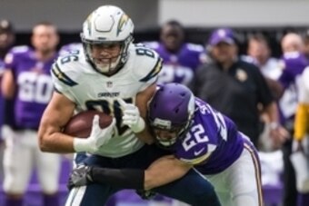 Aug 28, 2016; Minneapolis, MN, USA; San Diego Chargers tight end Hunter Henry (86) carries the ball as Minnesota Vikings safety Harrison Smith (22) tackles during the first quarter in a preseason game at U.S. Bank Stadium. Mandatory Credit: Brace Hemmelga