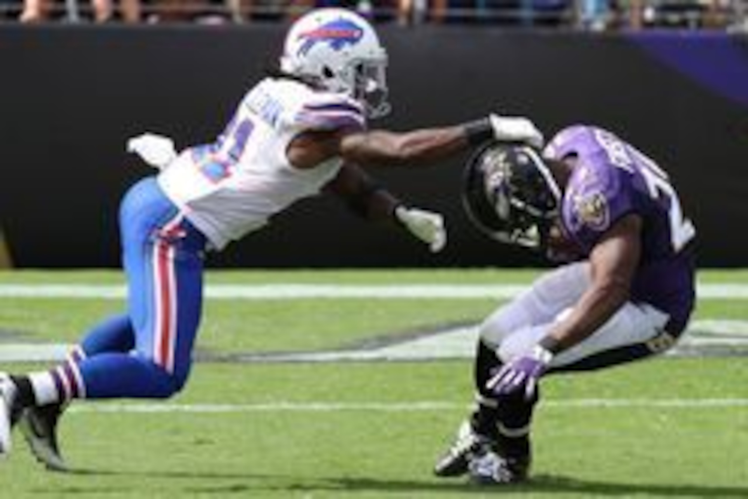 Sep 11, 2016; Baltimore, MD, USA; Baltimore Ravens running back Justin Forsett (29) tackled by Buffalo Bills cornerback Nickell Robey-Coleman (21) at M&T Bank Stadium. Mandatory Credit: Mitch Stringer-USA TODAY Sports