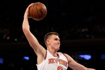 Feb 26, 2016; New York, NY, USA; New York Knicks forward Kristaps Porzingis (6) slam dunks the ball against the Orlando Magic during the second half at Madison Square Garden. The Knicks defeated the Magic 108-95. Mandatory Credit: Adam Hunger-USA TODAY Sp