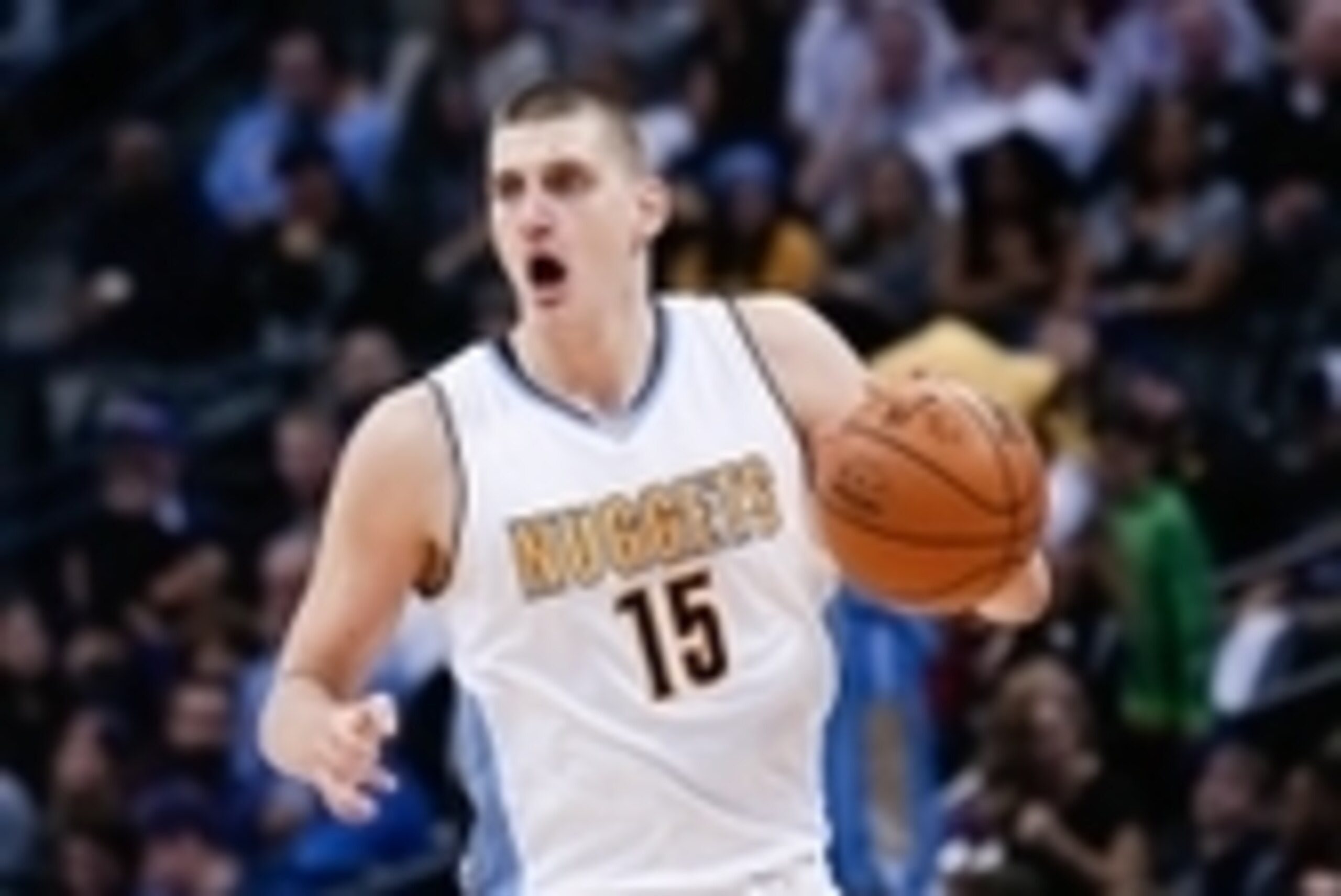 Mar 8, 2016; Denver, CO, USA; Denver Nuggets center Nikola Jokic (15) dribbles the ball up court in the second quarter against the New York Knicks at the Pepsi Center. Mandatory Credit: Isaiah J. Downing-USA TODAY Sports