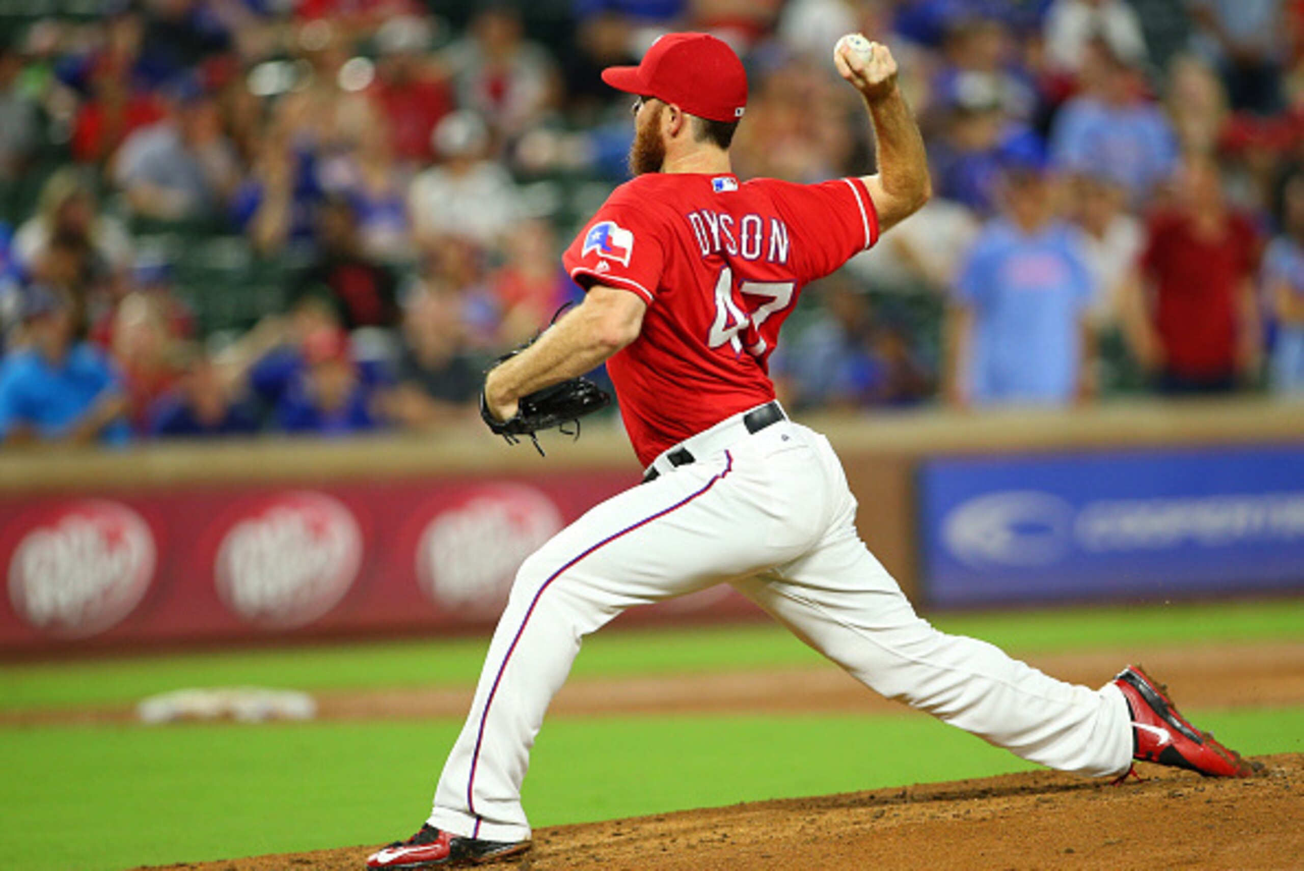 ARLINGTON, TX - SEPTEMBER 19: Sam Dyson #47 of the Texas Rangers throws in the ninth inning against the Los Angeles Angels of Anaheim at Globe Life Park in Arlington on September 19, 2016 in Arlington, Texas. (Photo by Rick Yeatts/Getty Images)
