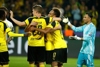 Dortmund's Gabonese forward Pierre-Emerick Aubameyang reacts ater scoring during the UEFA Champions League first leg football match between Borussia Dortmund and Real Madrid at BVB stadium in Dortmund, on September 27, 2016. / AFP / Odd ANDERSEN        (P