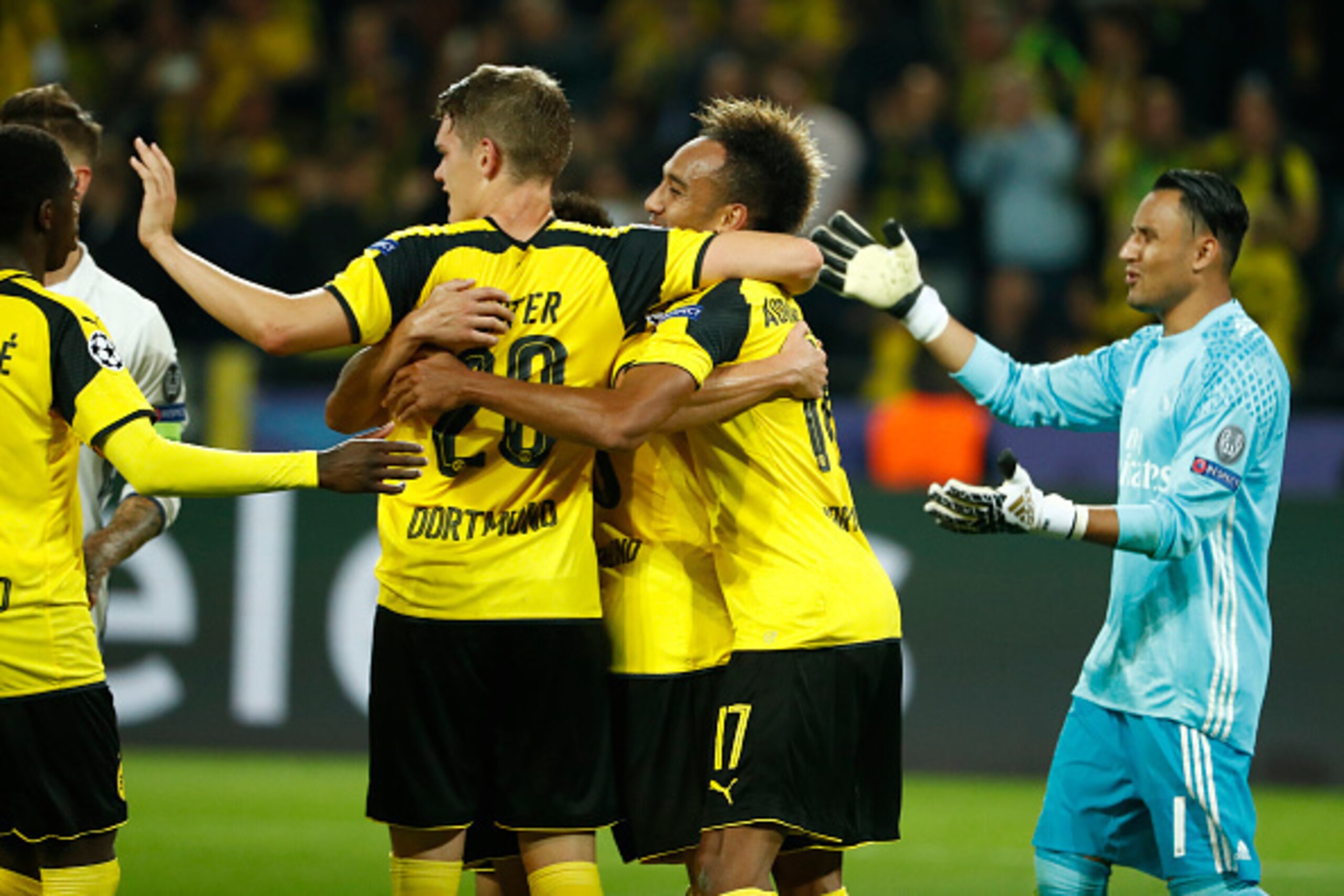 Dortmund's Gabonese forward Pierre-Emerick Aubameyang reacts ater scoring during the UEFA Champions League first leg football match between Borussia Dortmund and Real Madrid at BVB stadium in Dortmund, on September 27, 2016. / AFP / Odd ANDERSEN        (P