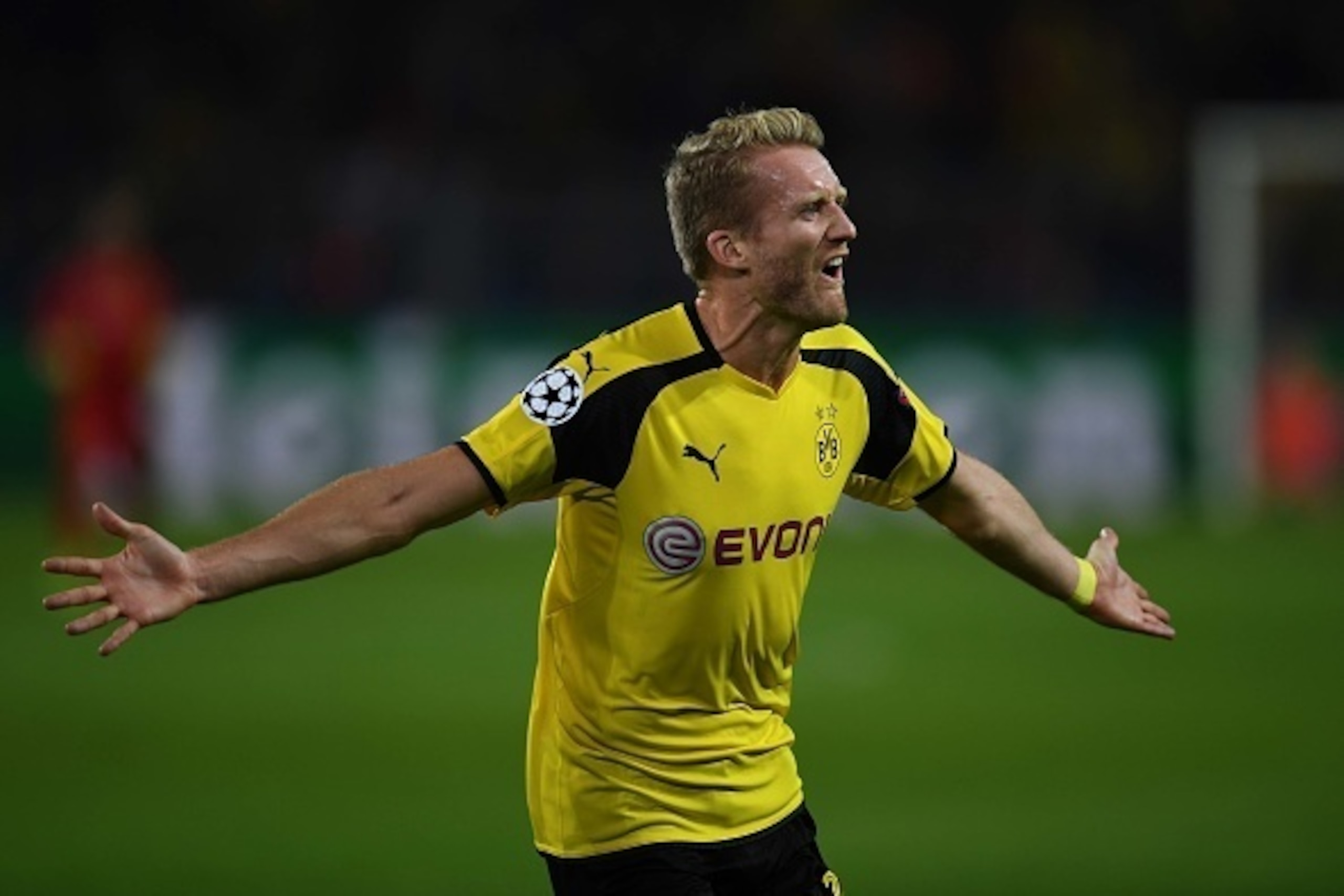 Dortmund's midfielder Andre Schuerrle reacts after scoring during the UEFA Champions League first leg football match between Borussia Dortmund and Real Madrid at BVB stadium in Dortmund, on September 27, 2016. / AFP / PATRIK STOLLARZ        (Photo credit 