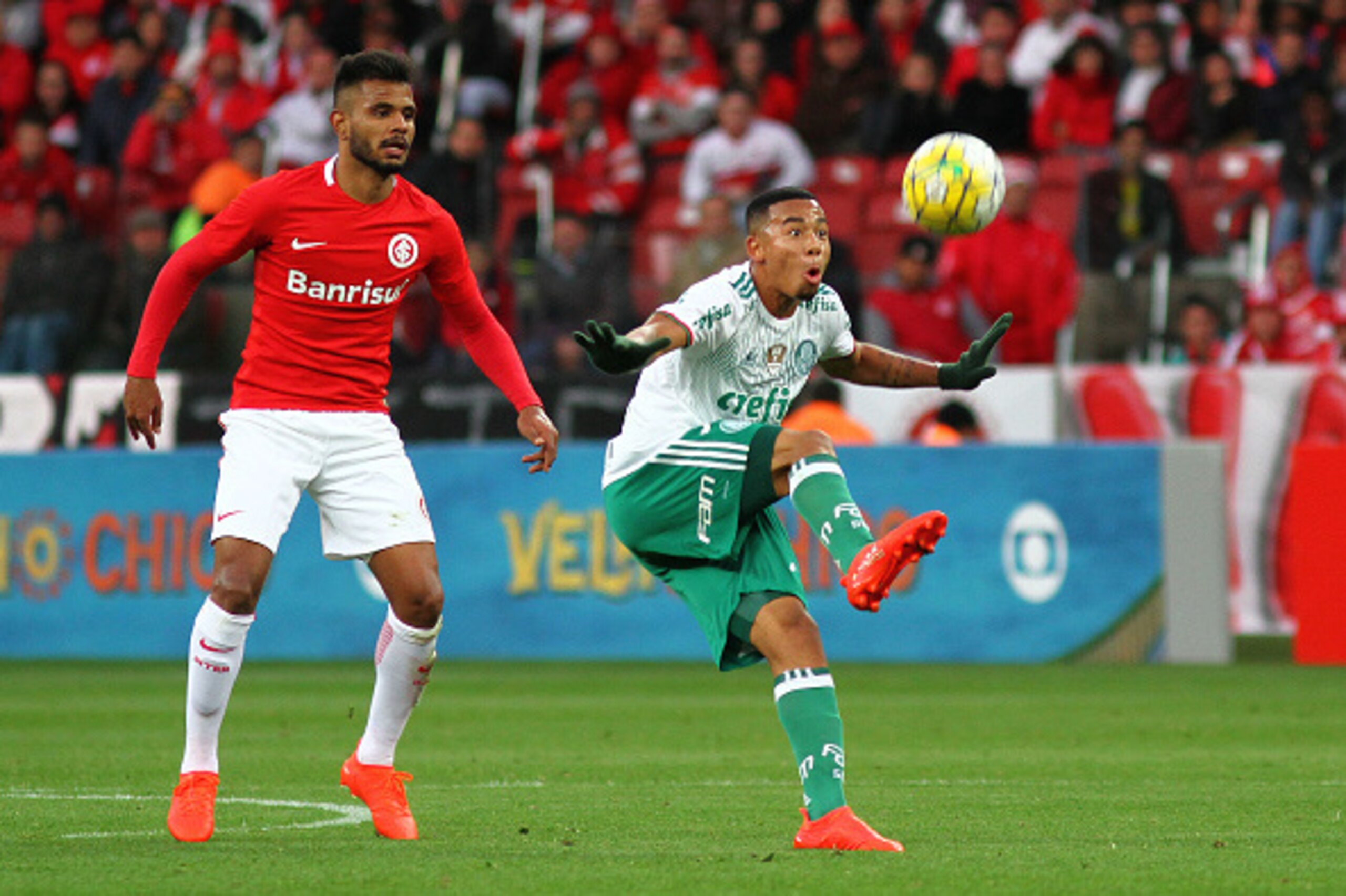 PORTO ALEGRE, BRAZIL - JULY 17: Fernando Bob of Internacional battles for the ball against Gabriel Jesus of Palmeiras during the match between Internacional and Palmeiras as part of Brasileirao Series A 2016, at Estadio Beira-Rio on July 17, 2016, in Port