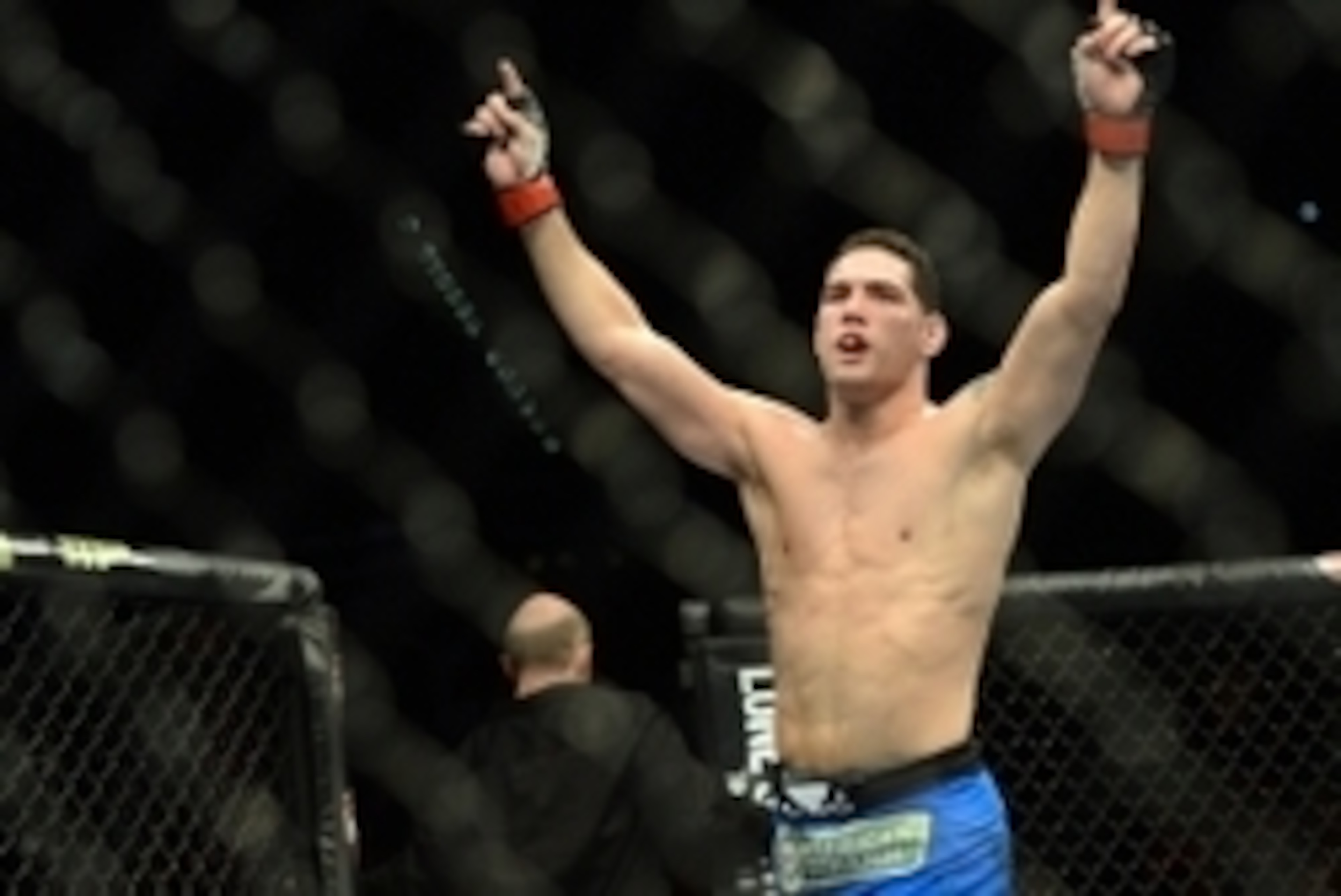 Dec 28, 2013; Las Vegas, NV, USA; Chris Weidman reacts in the cage after defeating Anderson Silva (not pictured) in their UFC middleweight championship bout at the MGM Grand Garden Arena. Mandatory Credit: Jayne Kamin-Oncea-USA TODAY Sports Dec 28, 2013; Las Vegas, NV, USA; Chris Weidman reacts in the cage after defeating Anderson Silva (not pictured) in their UFC middleweight championship bout at the MGM Grand Garden Arena. Mandatory Credit: Jayne Kamin-Oncea-USA TODAY Sports