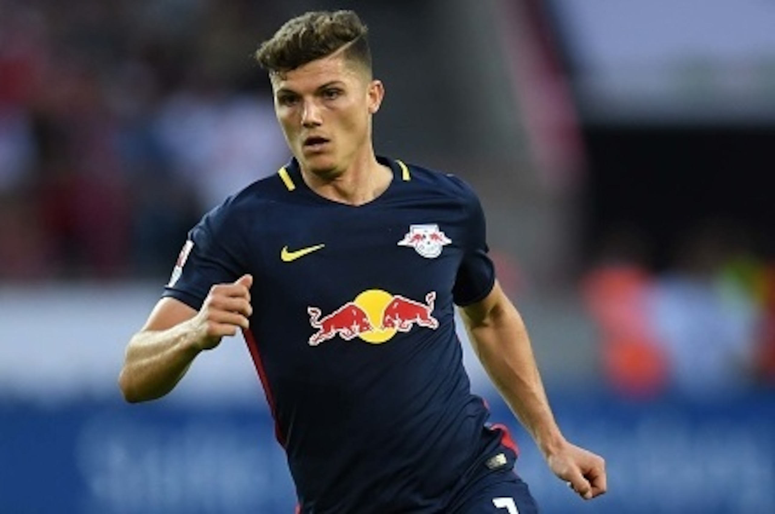 Leipzig´s Austrian midfielder Marcel Sabitzer vies for the ball during the German first division Bundesliga football match of 1 FC Cologne vs RB Leipzig in Cologne, western Germany, on September 25, 2016. / AFP / PATRIK STOLLARZ / RESTRICTIONS: DURING MAT