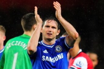 LONDON, ENGLAND - DECEMBER 23:  Frank Lampard of Chelsea applauds the fans at the final whistle during the Barclays Premier League match between Arsenal and Chelsea at Emirates Stadium on December 23, 2013 in London, England.  (Photo by Shaun Botterill/Ge