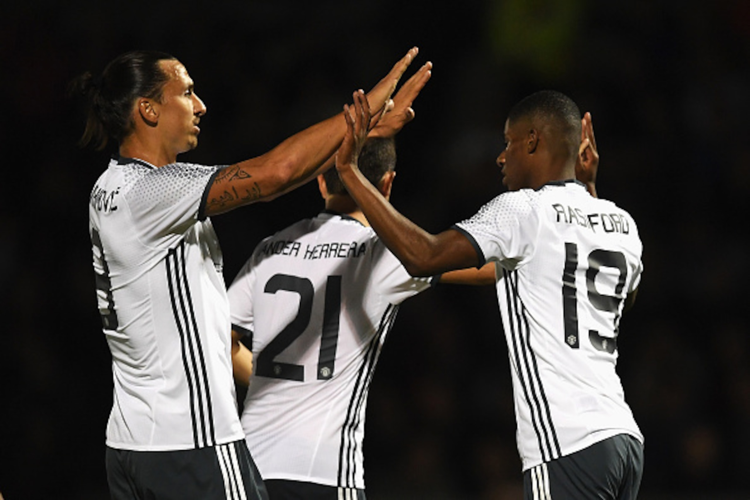 NORTHAMPTON, ENGLAND - SEPTEMBER 21:  Marcus Rashford of Manchester United celebrates scoring his sides third goal with Zlatan Ibrahimovic of Manchester United during the  EFL Cup Third Round match between Northampton Town and Manchester United at Sixfiel